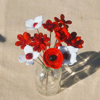Composition florale en verre de Murano avec des coquelicots, des Loreas, des marguerites et des fleurs sauvages et 