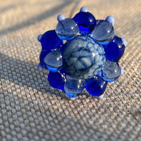fleur bleue à tetons en verre de Murano