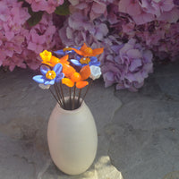 Composition Ana . Fleurs oranges et bleues en verre de Murano